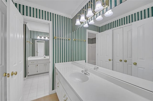 1405 Wilmington Way, Grayson, GA 30017 - full bath with wallpapered walls, ornamental molding, tile patterned flooring, a chandelier, and two vanities