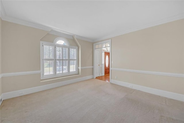 1405 Wilmington Way, Grayson, GA 30017 - empty room with crown molding, carpet floors, plenty of natural light, and baseboards