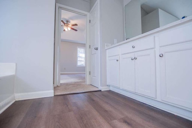 corridor with dark wood-type flooring