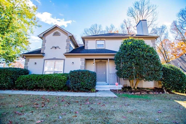 view of front property with a front lawn