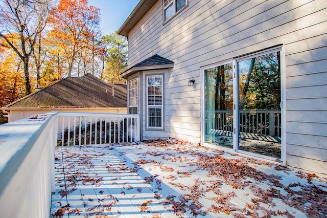 view of snow covered deck