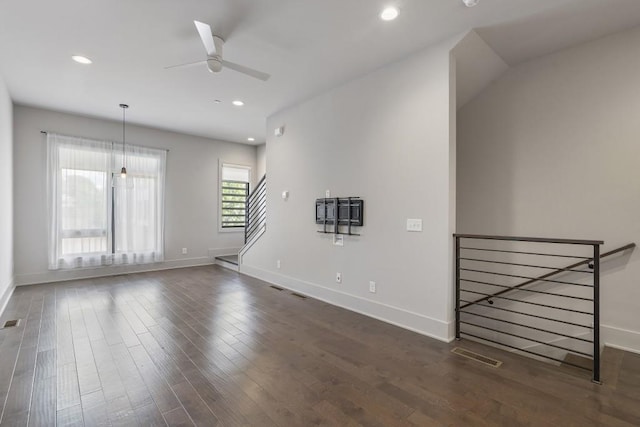 133 City View Ct NE, Atlanta, GA 30308 - unfurnished living room with a ceiling fan, recessed lighting, dark wood-type flooring, and stairway