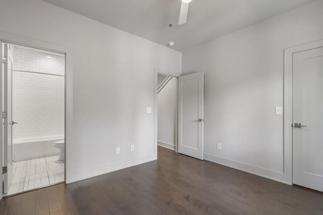 133 City View Ct NE, Atlanta, GA 30308 - unfurnished bedroom with wood finished floors, ensuite bathroom, and a ceiling fan