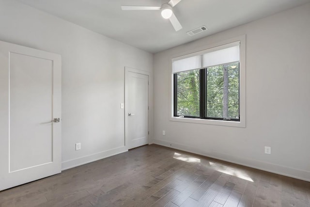 133 City View Ct NE, Atlanta, GA 30308 - unfurnished bedroom featuring wood finished floors and a ceiling fan