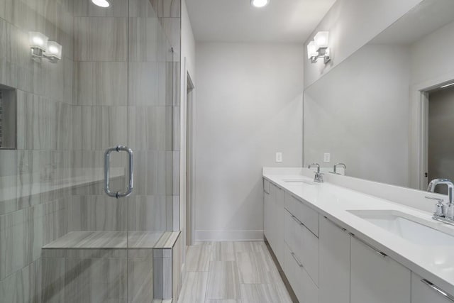 133 City View Ct NE, Atlanta, GA 30308 - full bathroom featuring double vanity, a stall shower, and recessed lighting