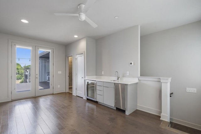 133 City View Ct NE, Atlanta, GA 30308 - kitchen featuring wine cooler, light countertops, dark wood-style floors, recessed lighting, and ceiling fan