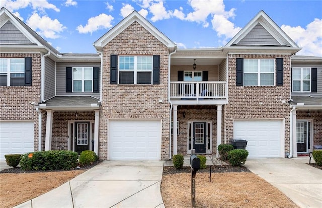 townhome / multi-family property featuring a garage