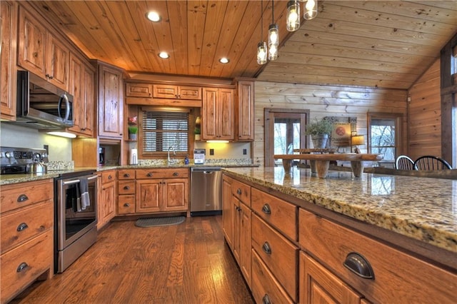 kitchen with wooden ceiling, light stone counters, dark hardwood / wood-style floors, wooden walls, and appliances with stainless steel finishes