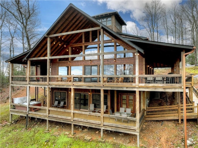 rear view of house with a deck