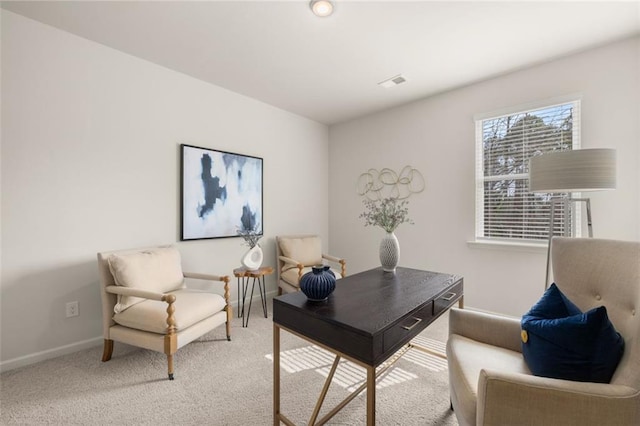 home office with visible vents, carpet floors, and baseboards