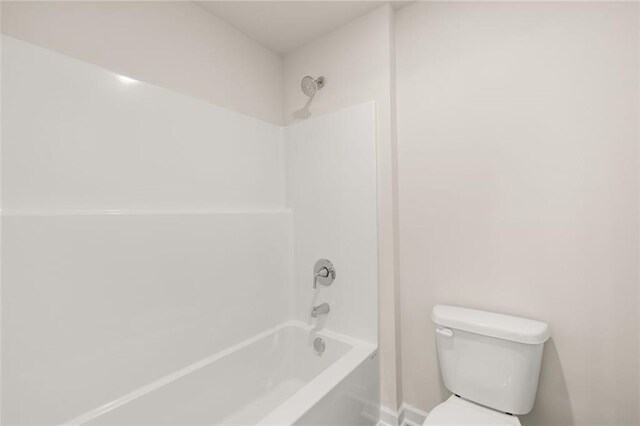 full bathroom with shower / washtub combination and toilet