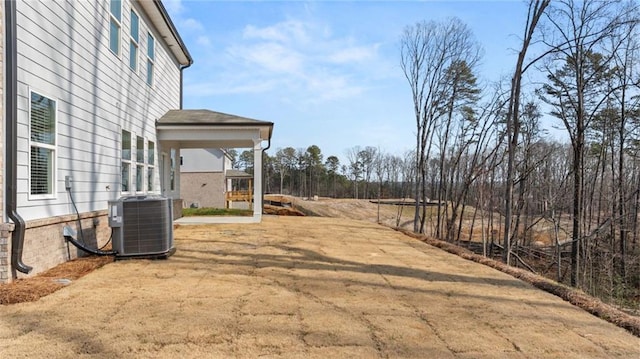 view of yard featuring central AC