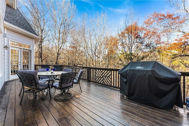 wooden deck with area for grilling