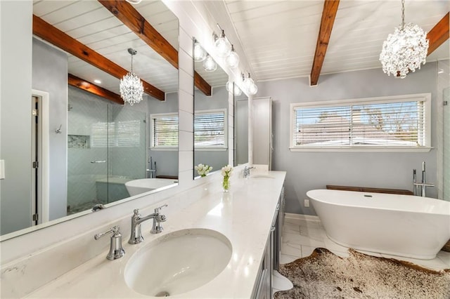 bathroom with marble finish floor, a sink, a shower stall, double vanity, and a soaking tub