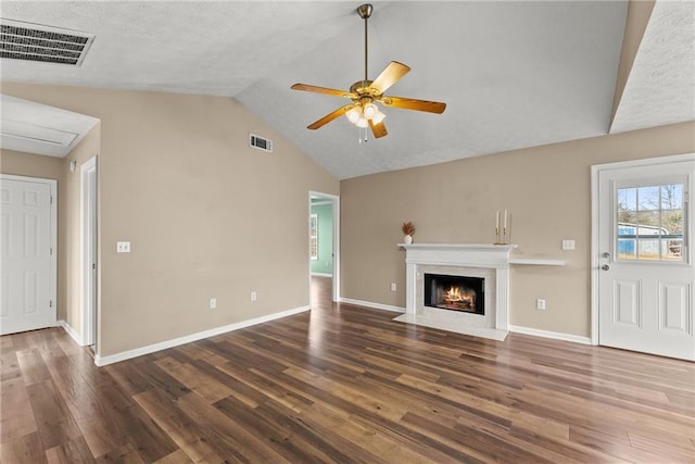 unfurnished living room with wood-type flooring, lofted ceiling, and ceiling fan