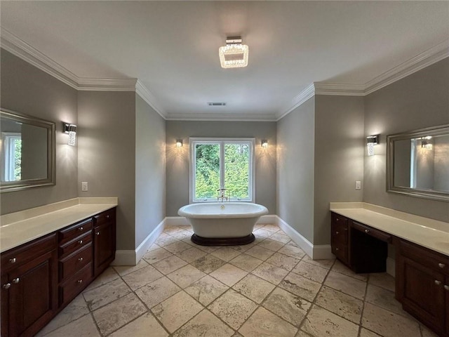 bathroom with a washtub, vanity, and ornamental molding