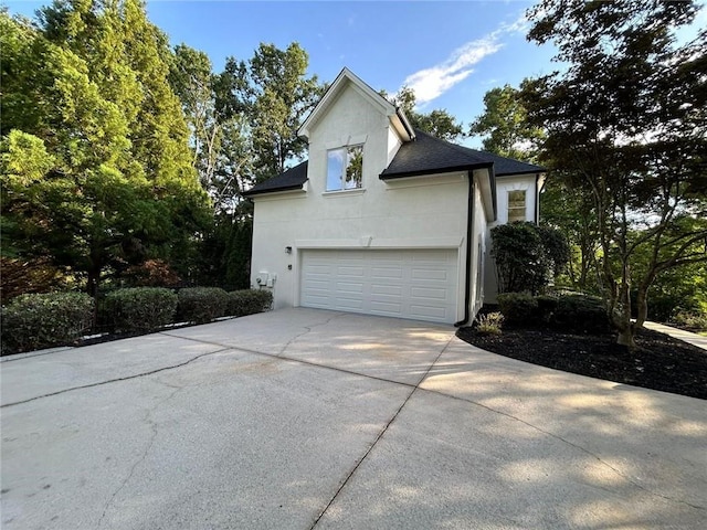 view of home's exterior with a garage