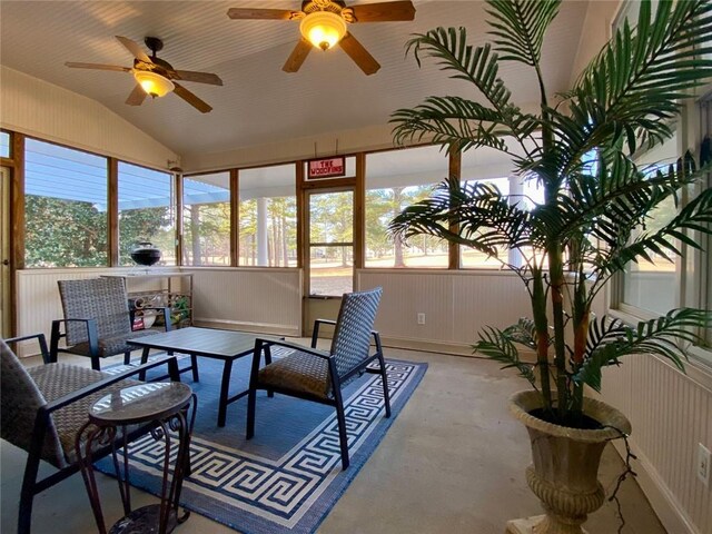 interior space featuring vaulted ceiling, ceiling fan, and french doors