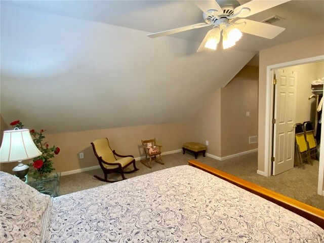 bedroom featuring ceiling fan and light colored carpet