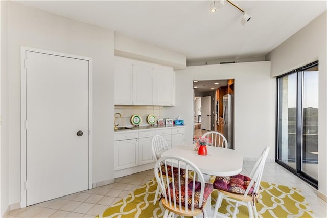 2660 Peachtree Rd NW Unit 18G, Atlanta, GA 30305 - dining space featuring light tile patterned flooring