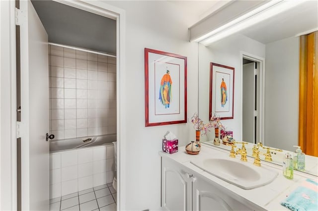 2660 Peachtree Rd NW Unit 18G, Atlanta, GA 30305 - bathroom with vanity, tile patterned flooring, toilet, and bathing tub / shower combination