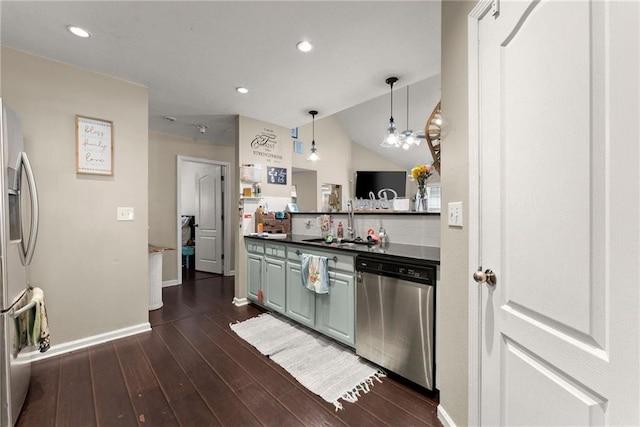 2691 Bald Cypress Dr, Braselton, GA 30517 - kitchen featuring stainless steel appliances, dark wood-type flooring, dark countertops, decorative light fixtures, and recessed lighting