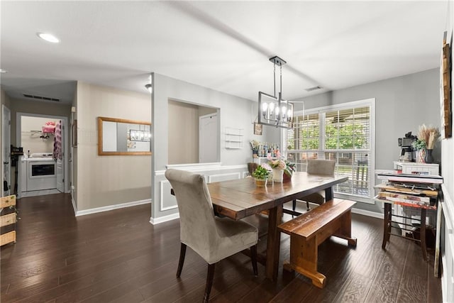 2691 Bald Cypress Dr, Braselton, GA 30517 - dining area featuring a chandelier, dark wood-style flooring, recessed lighting, and washer / dryer