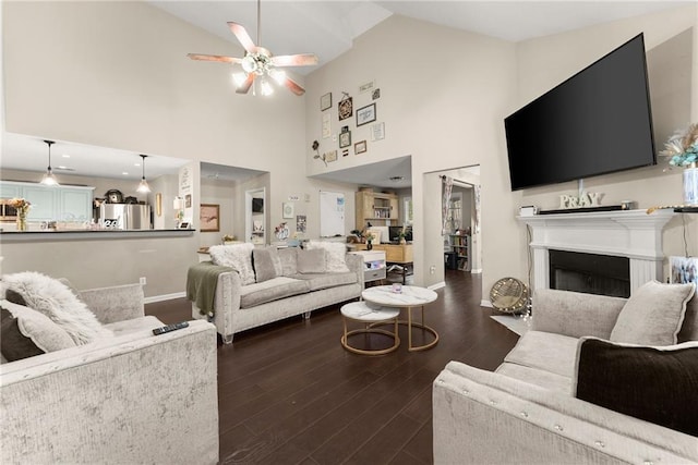 2691 Bald Cypress Dr, Braselton, GA 30517 - living room featuring high vaulted ceiling, a ceiling fan, wood finished floors, and a fireplace