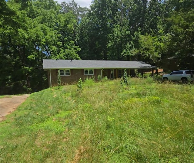 5533 Glore Dr SW, Mableton, GA 30126 - view of front facade featuring a wooded view