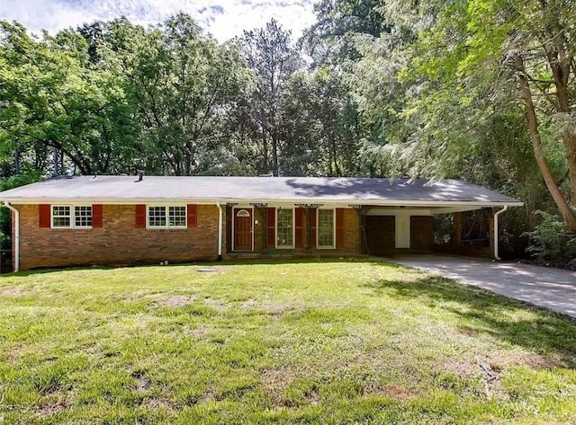 5533 Glore Dr SW, Mableton, GA 30126 - ranch-style house featuring an attached carport, a front lawn, driveway, and brick siding