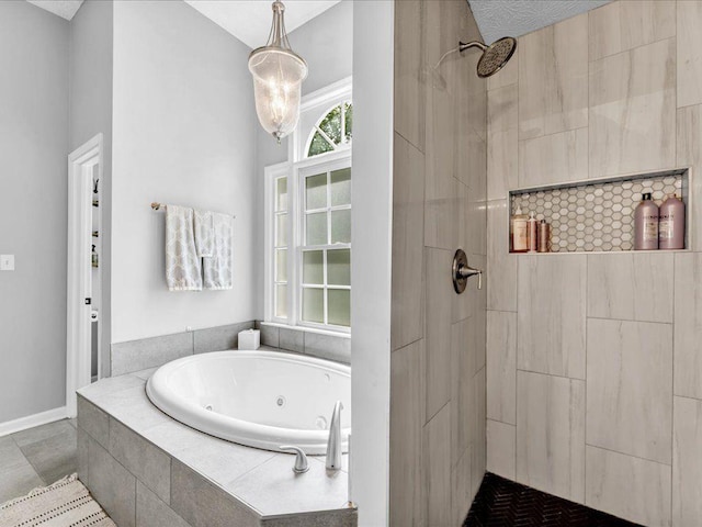 full bath with a tile shower and a tub with jets