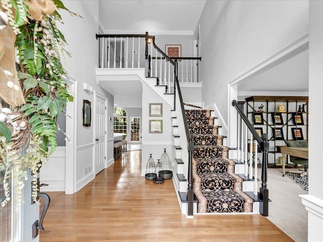 5625 Brookstone Dr NW, Acworth, GA 30101 - entryway with stairs, light wood finished floors, and a high ceiling
