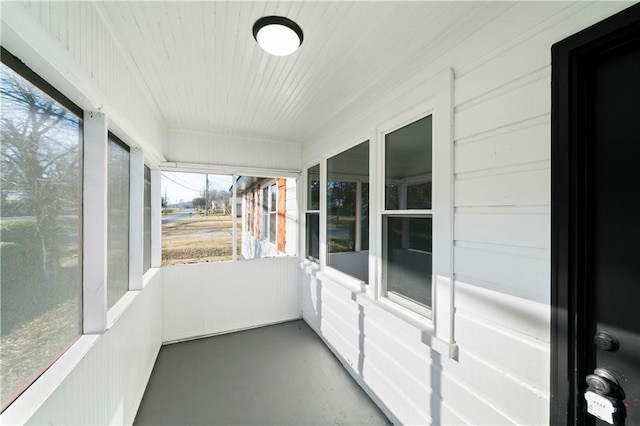 unfurnished sunroom featuring plenty of natural light