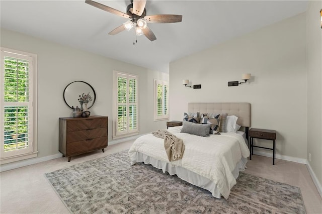 467 Liberty Grove Rd, Alpharetta, GA 30004 - carpeted bedroom with multiple windows, baseboards, lofted ceiling, and a ceiling fan