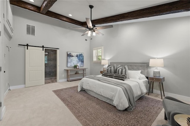 467 Liberty Grove Rd, Alpharetta, GA 30004 - bedroom with a barn door, beam ceiling, baseboards, light colored carpet, and recessed lighting