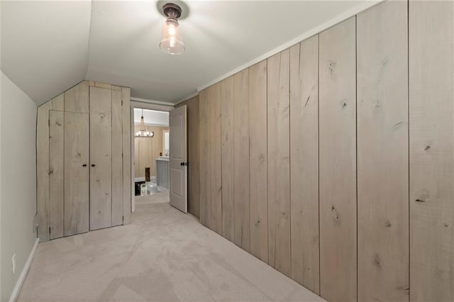 467 Liberty Grove Rd, Alpharetta, GA 30004 - unfurnished bedroom with carpet flooring, wooden walls, connected bathroom, and lofted ceiling