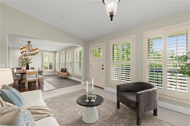 467 Liberty Grove Rd, Alpharetta, GA 30004 - living room with a chandelier, lofted ceiling, and baseboards