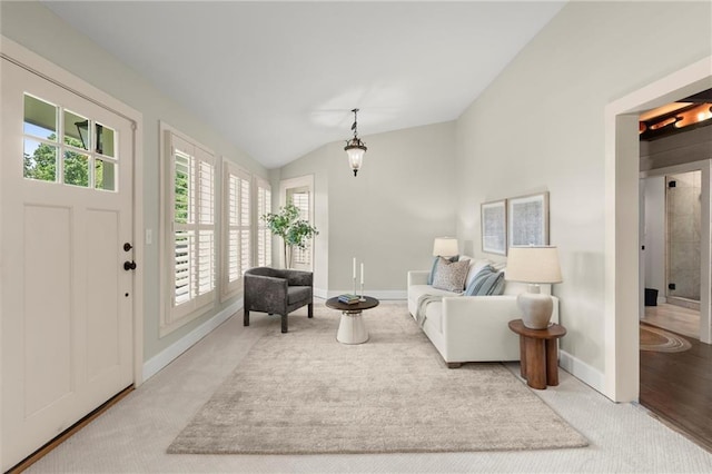 467 Liberty Grove Rd, Alpharetta, GA 30004 - carpeted living area with baseboards and lofted ceiling