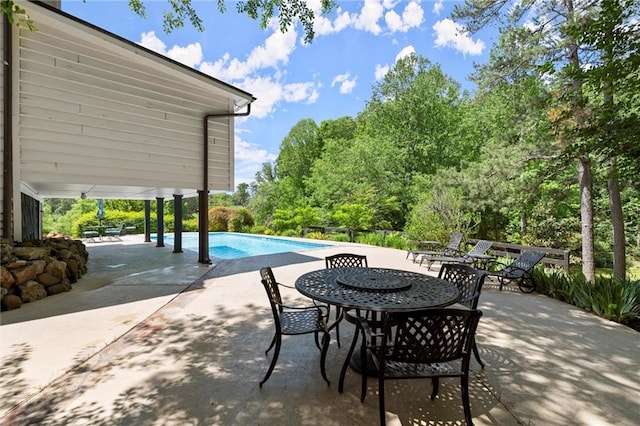 467 Liberty Grove Rd, Alpharetta, GA 30004 - view of patio / terrace featuring an outdoor pool and view of wooded area
