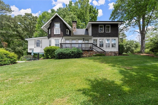 467 Liberty Grove Rd, Alpharetta, GA 30004 - rear view of property featuring a chimney, a lawn, and a deck