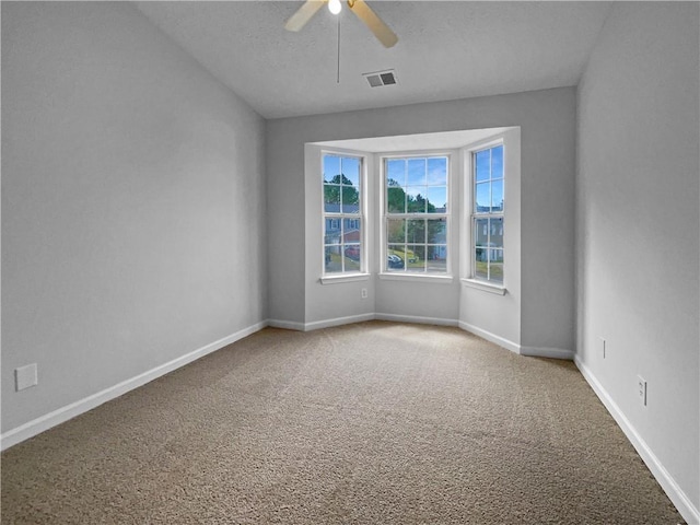 45 Hampton Dr, Cartersville, GA 30121 - unfurnished room with visible vents, baseboards, carpet, a textured ceiling, and a ceiling fan