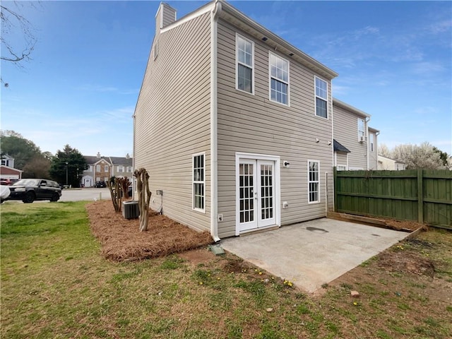 45 Hampton Dr, Cartersville, GA 30121 - rear view of property with fence, french doors, a chimney, a yard, and a patio area