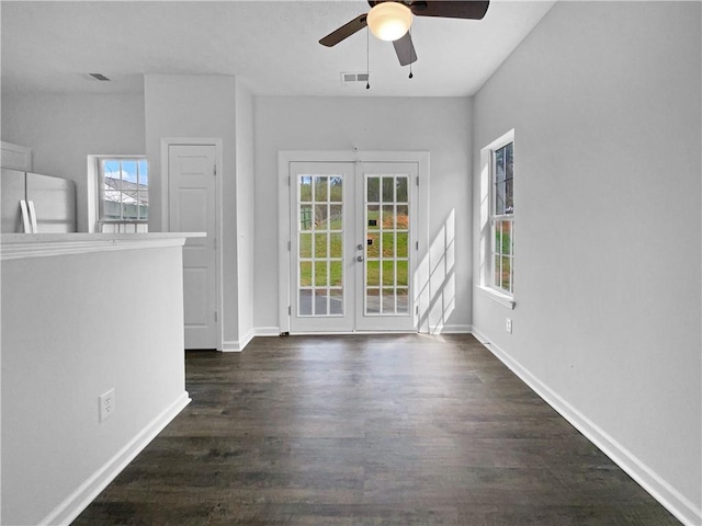 45 Hampton Dr, Cartersville, GA 30121 - empty room with a ceiling fan, visible vents, baseboards, dark wood-style flooring, and french doors