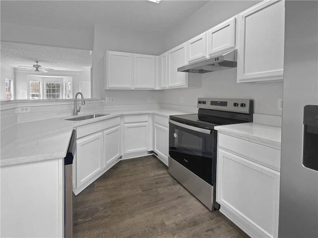 45 Hampton Dr, Cartersville, GA 30121 - kitchen with a ceiling fan, a sink, stainless steel appliances, white cabinets, and under cabinet range hood