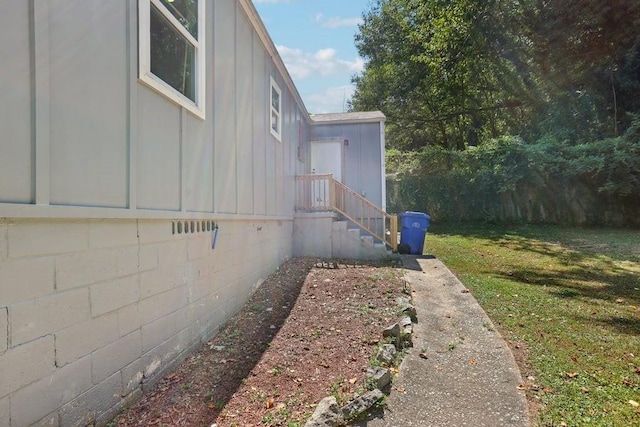 view of home's exterior featuring a lawn