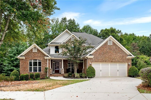 craftsman house with a garage