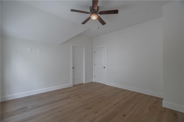 unfurnished room with light wood-type flooring and ceiling fan