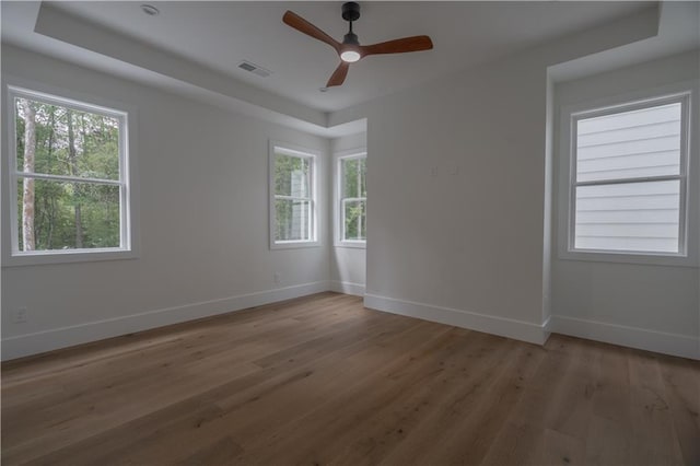 empty room featuring light hardwood / wood-style floors and ceiling fan