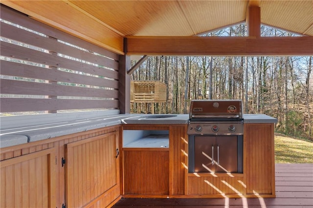 view of patio / terrace featuring area for grilling and a wooden deck