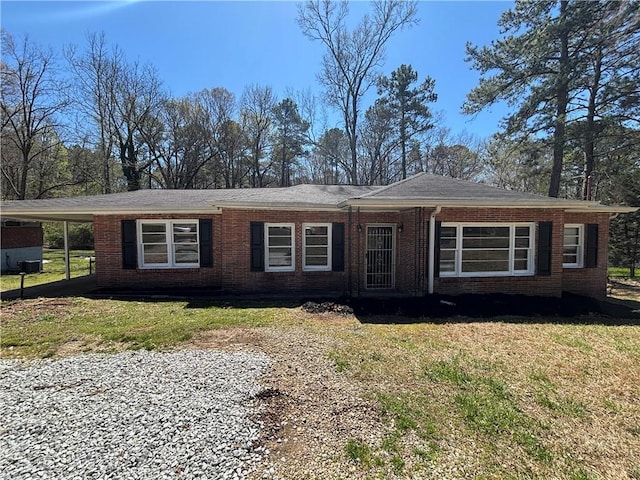 2103 River Rd, Ellenwood, GA 30294 - single story home featuring brick siding, a front yard, and a carport